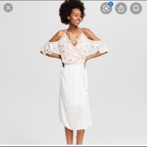 Midi length ivory cold shoulder dress